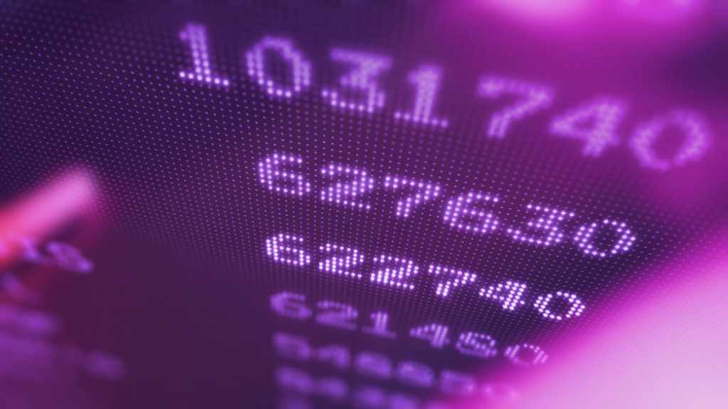 Digital LED display screen with pixelated text in purple lighting - accounting services for tech startups and digital creative businesses